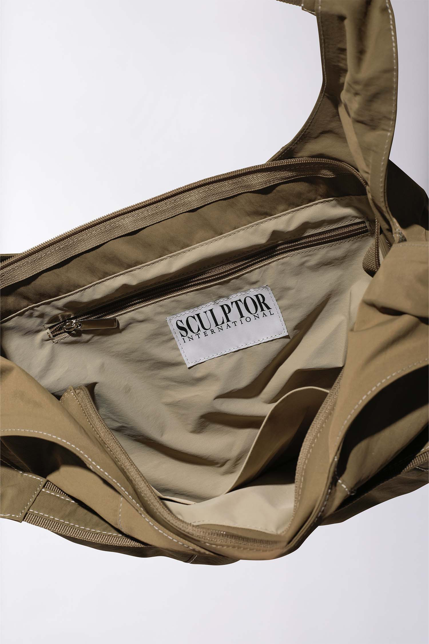🆕 Pre-order ] Sculptor Nylon Moon Bag – lesson.zero